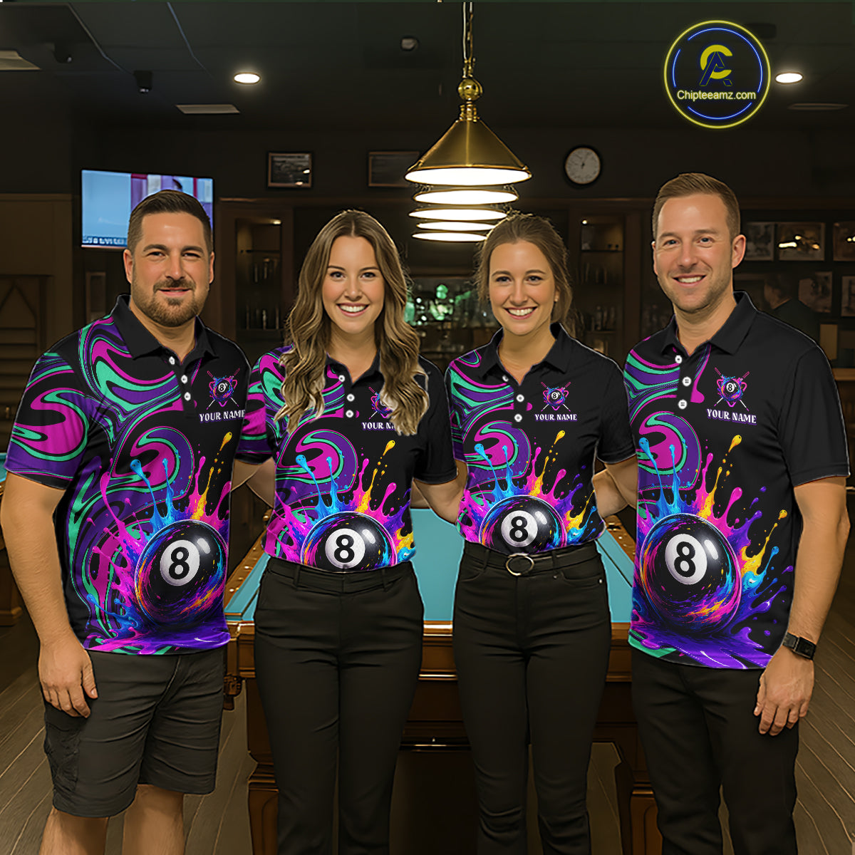 Four people standing together in a dimly lit bar or pool hall, wearing matching black polo shirts with a colorful neon-style graphic featuring an 8-ball and the text 'YOUR NAME' 