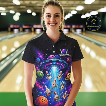 Woman wearing a colorful bowling shirt with UFO design in a bowling alley.