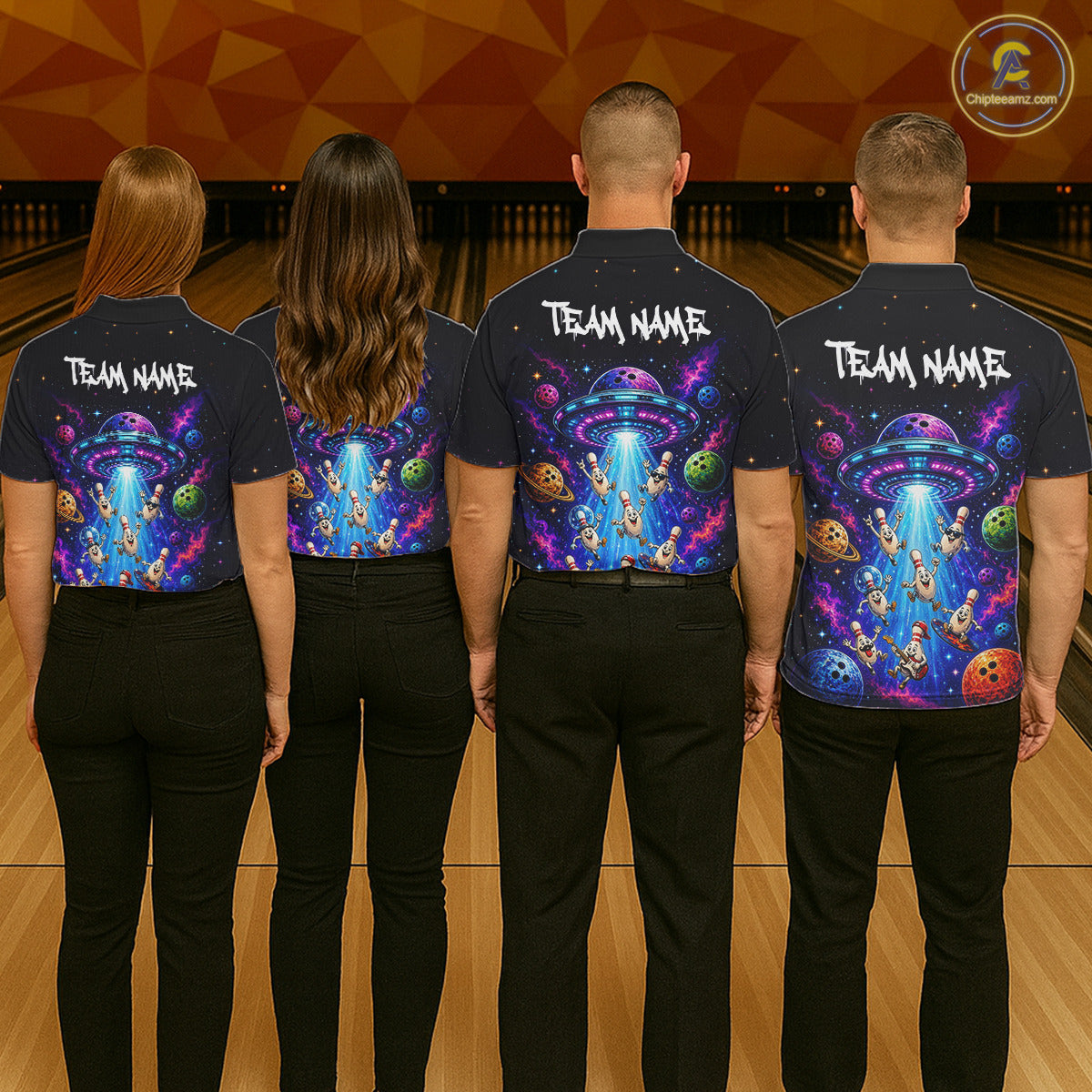 Four people wearing matching shirts with a colorful design on a bowling alley.