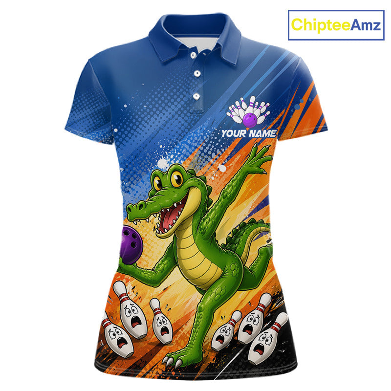 A short-sleeve polo shirt with a vibrant all-over bowling-themed graphic featuring a green cartoon alligator holding a purple bowling ball, bowling pins, and orange and blue abstract background stripes. The shirt has a blue collar and sleeve, white buttons, and 'YOUR NAME' printed on the chest.