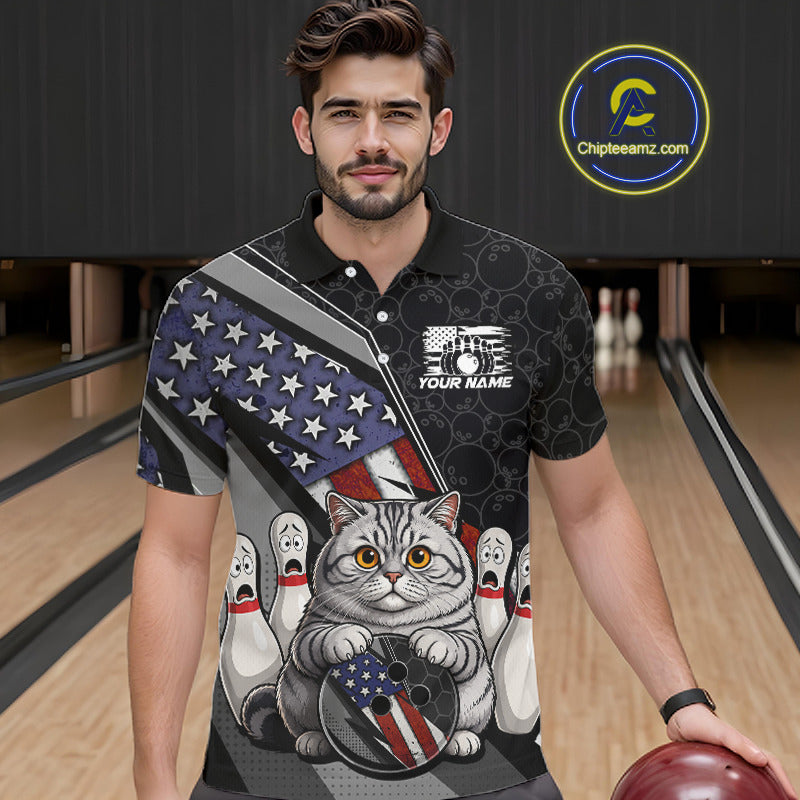 Man wearing custom black patriotic cat bowling polo shirt front view featuring a cute cartoon feline, American flag and bowling ball, displaying Your Name, at the bowling alley