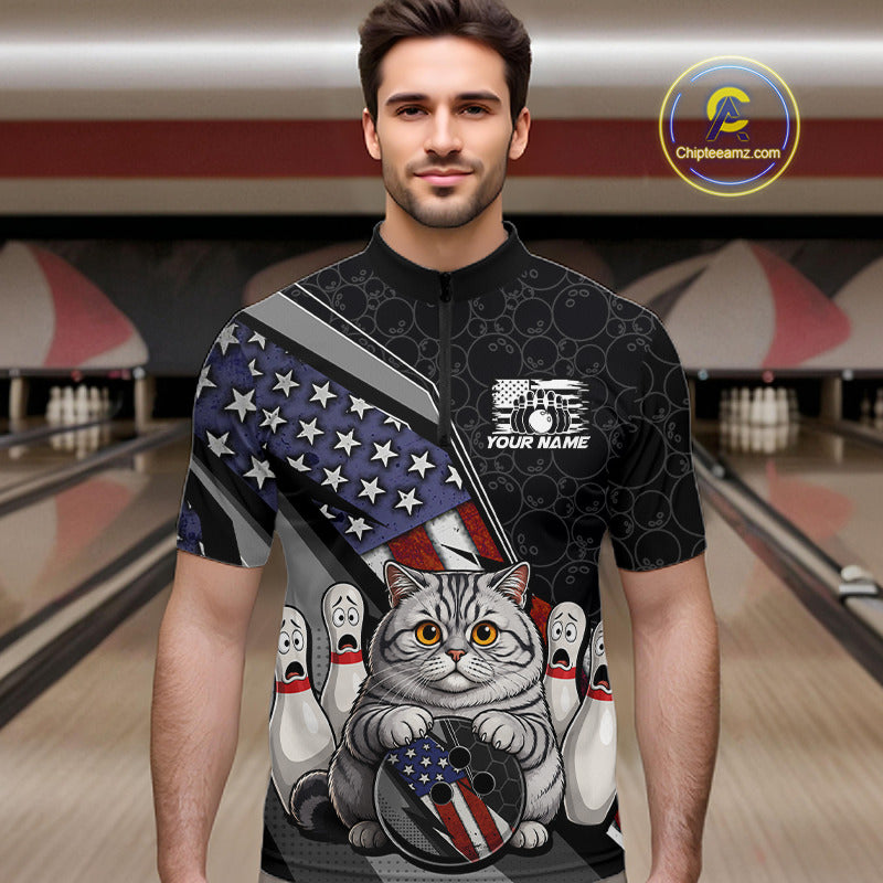 A man wearing a short-sleeve bowling-themed graphic shirt with a cat holding a bowling ball and bowling pins, set against a bowling alley background. 