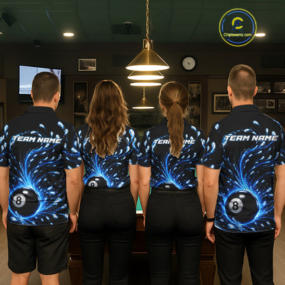 Four people wearing matching billiard shirts with a blue and black design in a pool hall.