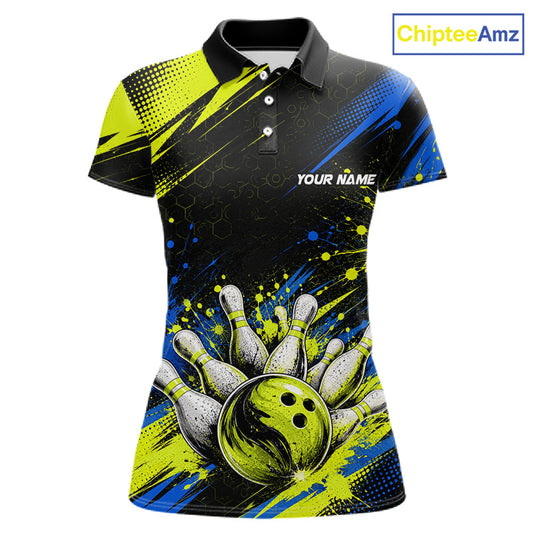 A women's short-sleeve polo shirt with a bowling-themed graphic print. The design features a black background with neon yellow and blue paint splatters, a bowling ball and pins illustration on the lower front, and a customizable name placeholder 'YOUR NAME' on the chest.