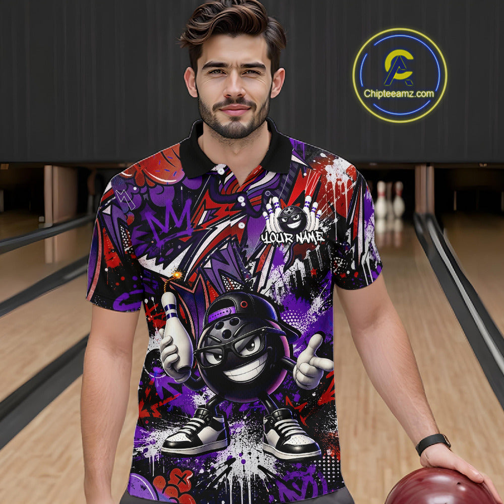 Man wearing a colorful bowling shirt with a cartoon character in a bowling alley.