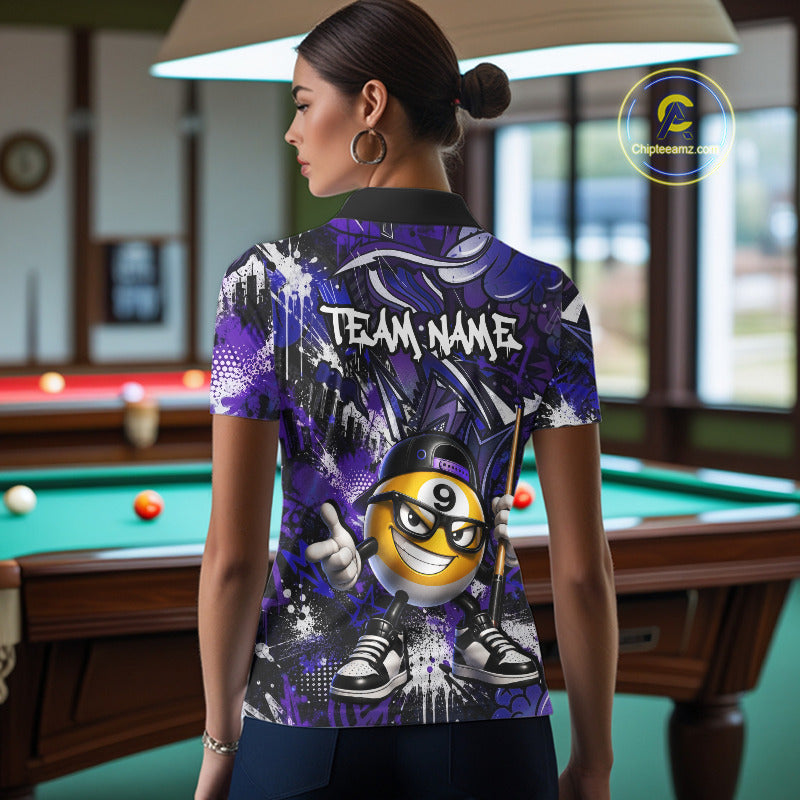 Person wearing a purple and blue shirt with a billiard ball design in a pool hall.