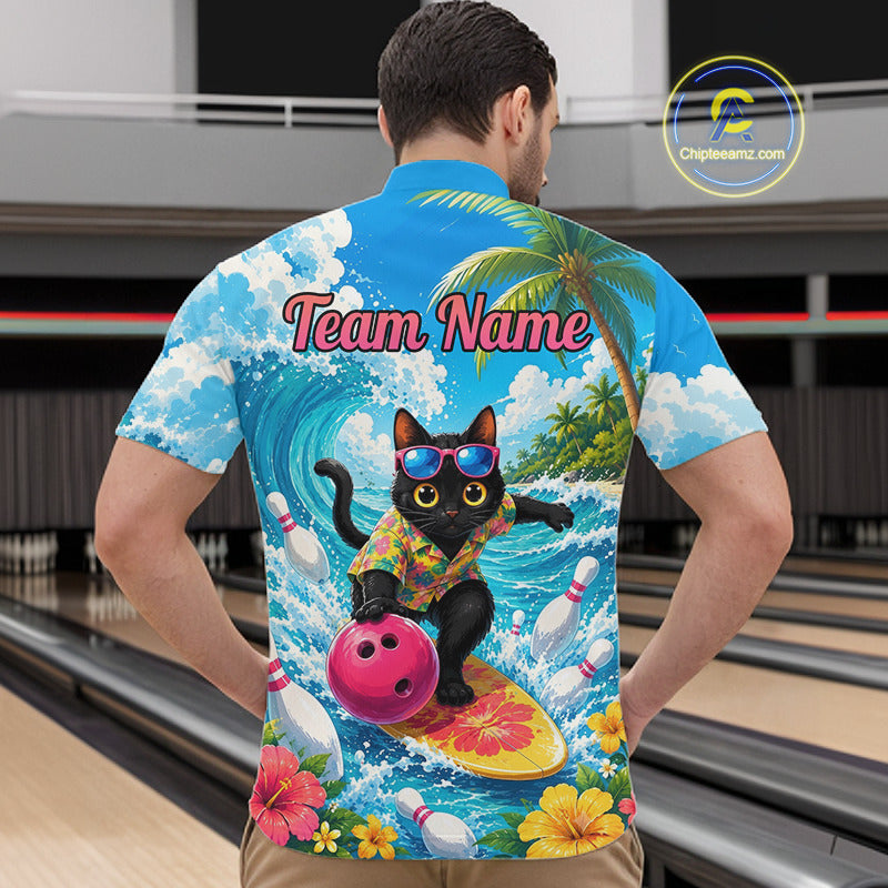 A man viewed from behind wearing a short-sleeve button-up shirt with a colorful bowling-themed graphic print. The shirt features a black cat surfing on a surfboard with a pink bowling ball, palm trees, waves, and the text 'Team Name' on the back.
