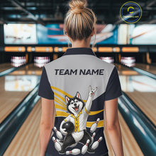 Load image into Gallery viewer, Person wearing a bowling shirt with a dog graphic and 'TEAM NAME' text in a bowling alley.