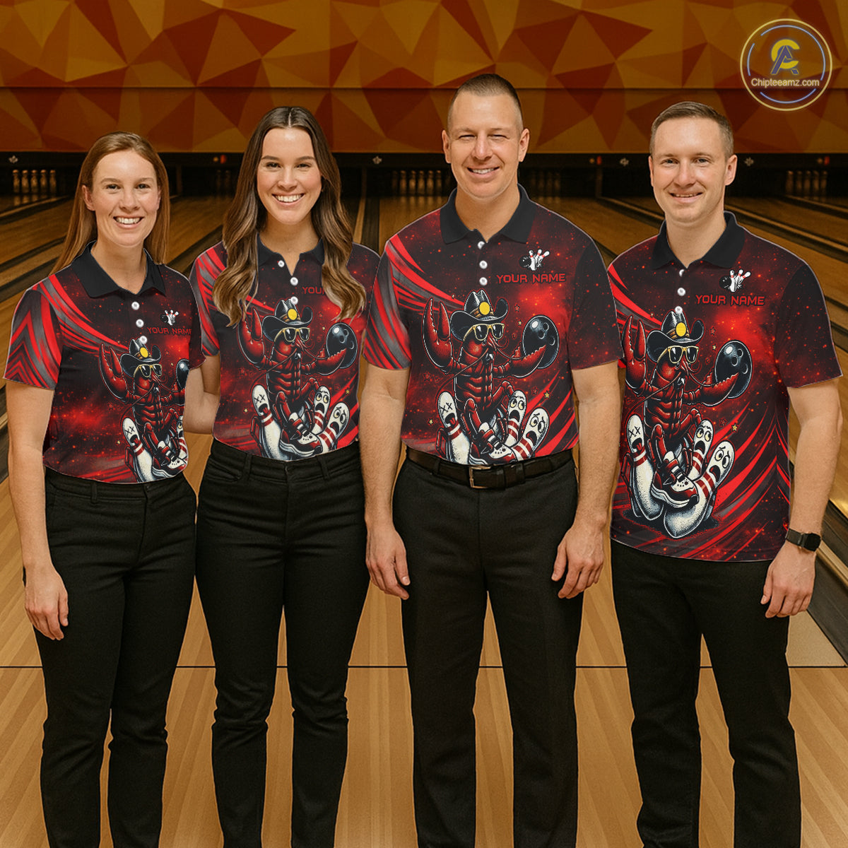 Four people wearing matching bowling shirts with a red and black design on a bowling alley.