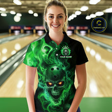 Load image into Gallery viewer, Woman wearing a black bowling polo shirt featuring a flaming skull with glowing orange eyes, green smoke effects, and custom “YOUR NAME” text.