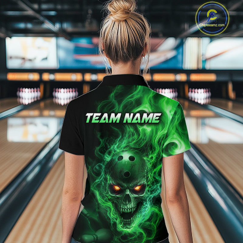 Women wearing a black bowling quarter zip shirt featuring a flaming skull with glowing orange eyes, green smoke effects, and custom “TEAM NAME” text.