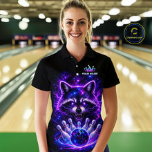 Load image into Gallery viewer, A woman stands in a bowling alley wearing a black short-sleeve polo shirt with a vivid purple and blue graphic of a raccoon surrounded by lightning and bowling pins. The shirt has a custom logo area on the chest and a circular 'Chileenseam.