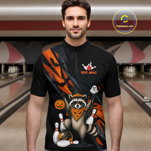 Load image into Gallery viewer, Man wearing a black Halloween bowling quarter zip featuring a raccoon wearing an orange bandana, ghost and pumpkin accents, bowling pins and ball, with personalized name and team name text.