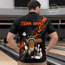 Load image into Gallery viewer, Man wearing a black Halloween bowling quarter zip featuring a raccoon wearing an orange bandana, ghost and pumpkin accents, bowling pins and ball, with personalized name and team name text.