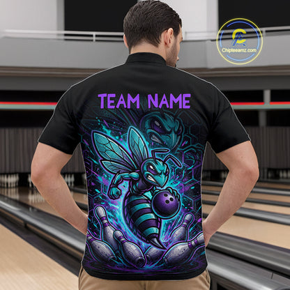 Person wearing a black bowling quarter zip with teal and purple bee graphics, custom team text, bowling pins, and a purple bowling ball.