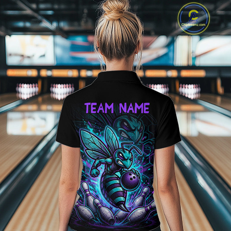 Woman wearing a black bowling quarter zip with teal and purple bee graphics, custom team text, bowling pins, and a purple bowling ball.