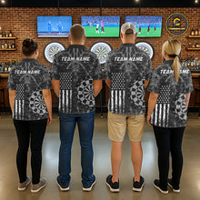 Load image into Gallery viewer, Four people wearing darts polo shirt featuring dartboard graphics blended with a american flag flag pattern on a black gray background.