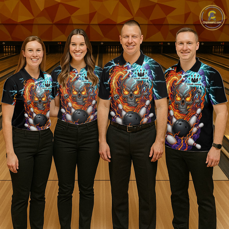 Four people wearing black bowling polo featuring a flaming skull graphic, lightning effects, bowling pins, and a black bowling ball, with custom player name text.