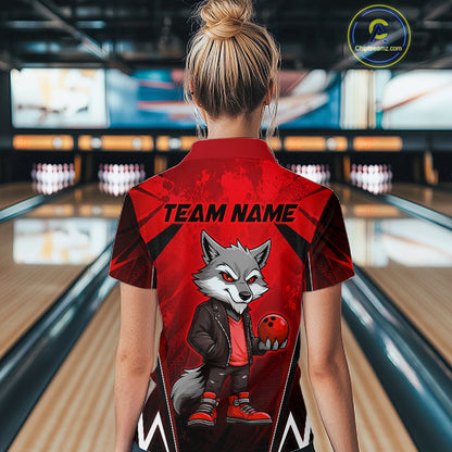 Woman wearing a red and black bowling polo shirt featuring a gray wolf mascot holding a red bowling ball, with custom team name text.