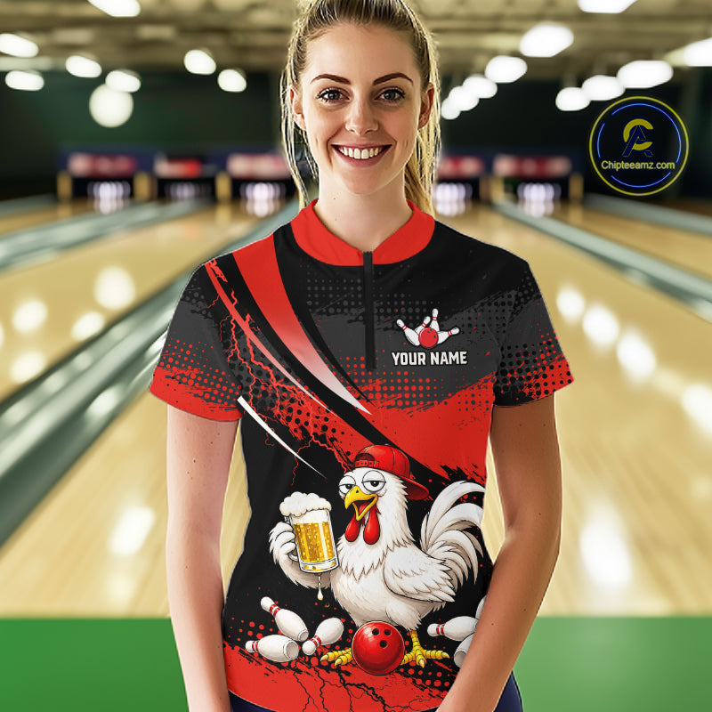 Woman wearing a red and black bowling quarter zip featuring a chicken holding a beer mug, red bowling ball, scattered pins, and custom your name text.