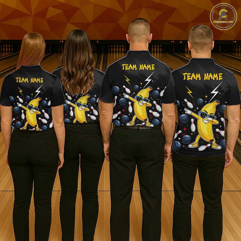 Four people wearing black bowling shirts with a yellow banana character and 'Team Name' text on a bowling alley background.