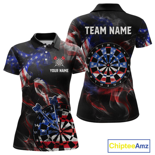 Front and back views of a black darts polo featuring patriotic American flag smoke graphics, dartboards, blue darts, and custom team and player name text.