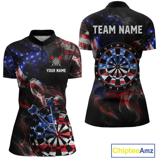 Front and back views of a black darts quarter zip featuring patriotic American flag smoke graphics, dartboards, blue darts, and custom team and player name text.