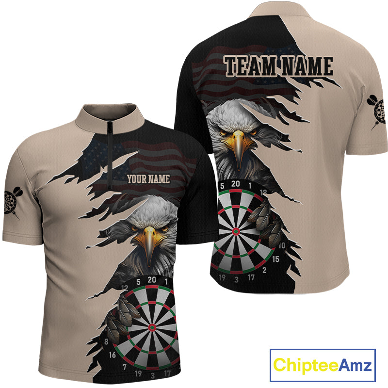 Front and back views of a beige and black darts quarter zip featuring a bald eagle, torn-flag graphics, dartboard designs, and custom team text.