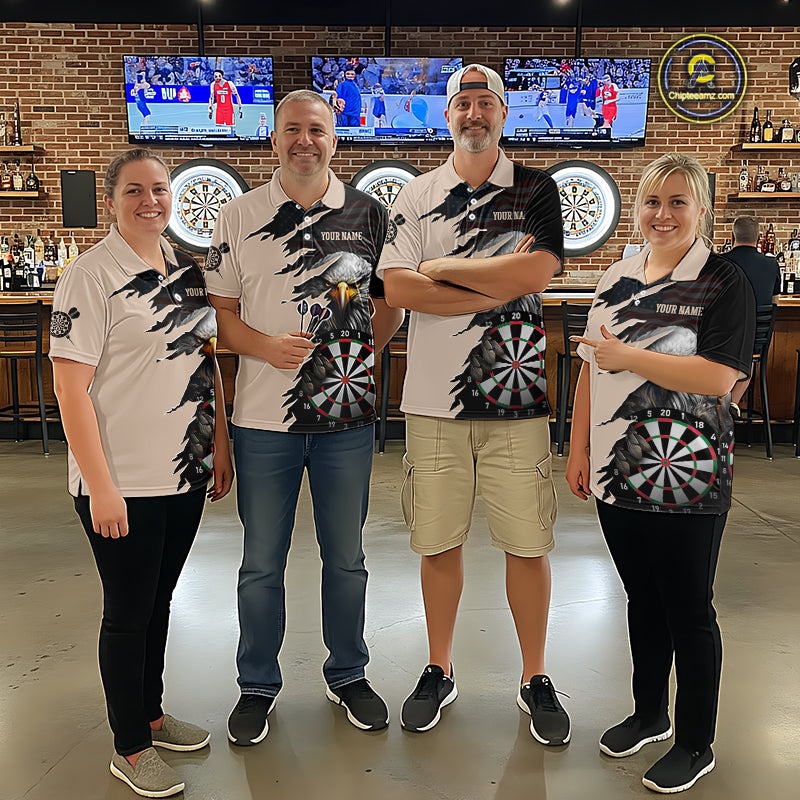 Four people beige and black darts polo featuring a bald eagle, torn-flag graphics, dartboard designs, and custom team text.