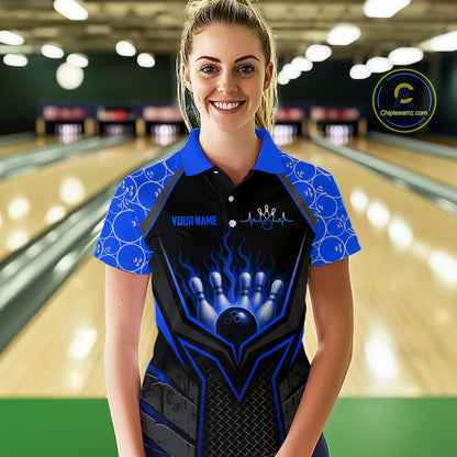 Woman wearing a custom bowling shirt with a bowling design in a bowling alley.