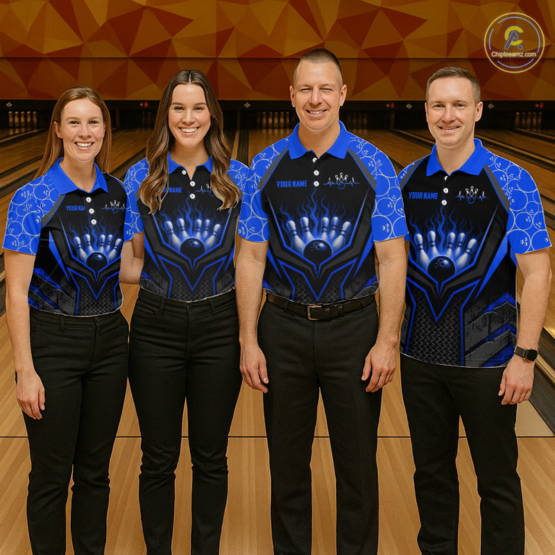 Four people wearing matching blue and black bowling shirts on a bowling alley.