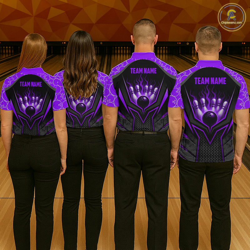 Four people wearing matching purple and black bowling shirts with a team name on a bowling alley.