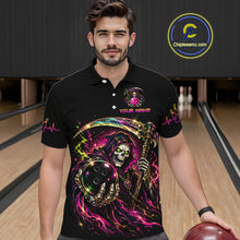 Load image into Gallery viewer, Man wearing a black polo shirt with colorful graphic design in a bowling alley.
