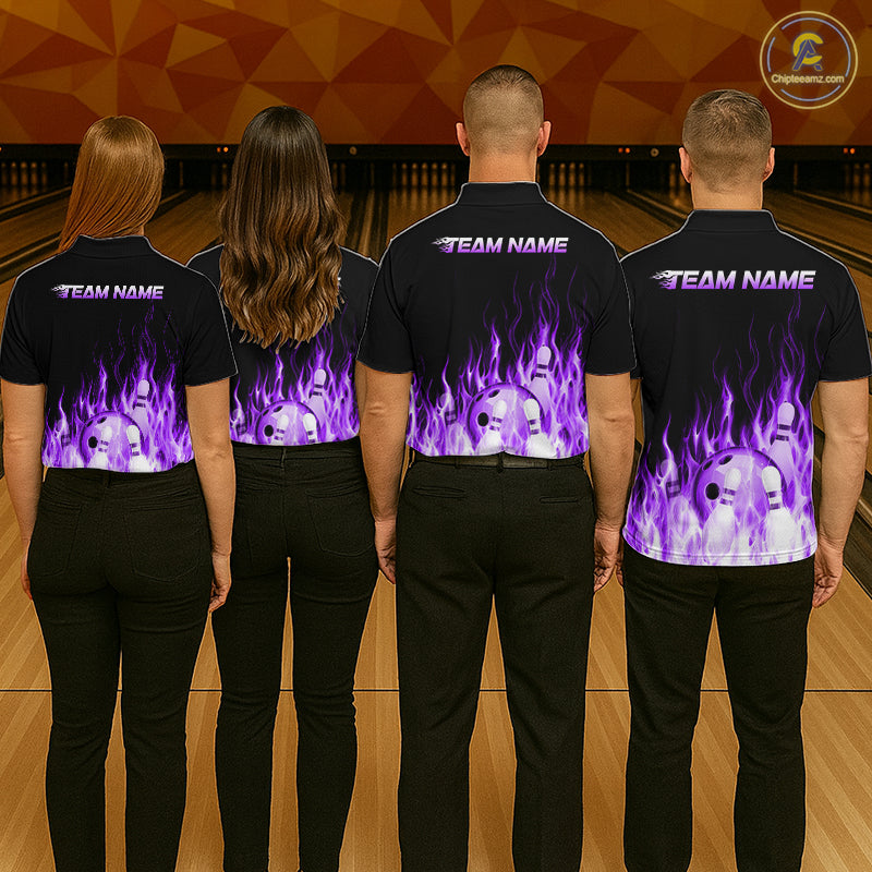 Four people wearing black shirts with purple flame designs on a bowling alley background