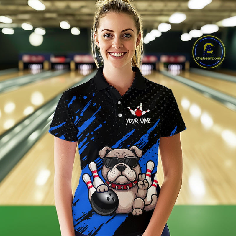 Women’s blue Bulldog bowling polo shirt, front view on female model in bowling lane 