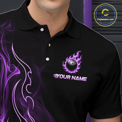 A close-up of a man wearing a black polo shirt with a purple flame graphic on the left side and a custom bowling-themed chest print featuring a black bowling ball with purple flames and the text 'YOUR NAME'.