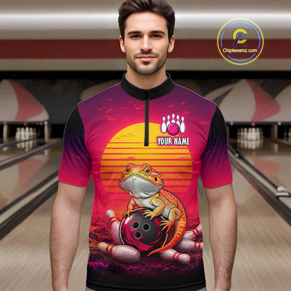 Men’s retro sunset bearded dragon bowling quarter zip shirt, front view on male model in bowling lane 