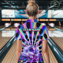 Load image into Gallery viewer, Women’s neon cosmic bowling quarter zip shirt, back view on female model in bowling lane 