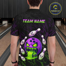 Load image into Gallery viewer, Person wearing a black bowling shirt with colorful designs and 'TEAM NAME' text in a bowling alley.