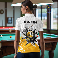 Load image into Gallery viewer, Woman wearing a white polo shirt with a pool-themed design in a billiards room.