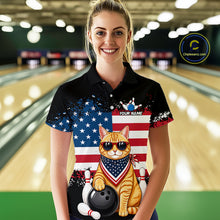 Load image into Gallery viewer, Women’s us flag cat bowling polo shirt, front view on female model in bowling lane 