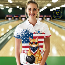 Load image into Gallery viewer, Women’s us flag cat bowling polo shirt, front view on female model in bowling lane 