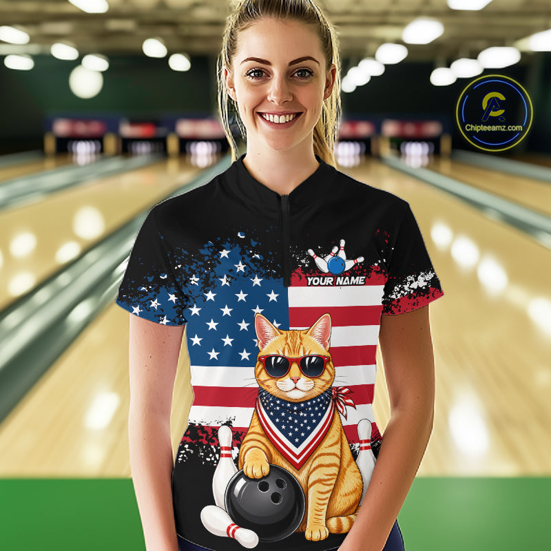 Women’s us flag cat bowling quarter zip shirt, front view on female model in bowling lane 