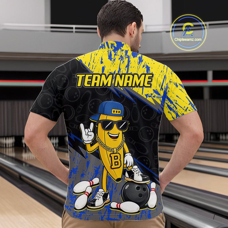 Man wearing a bowling-themed shirt with a cartoon character and 'Team Name' text in a bowling alley.