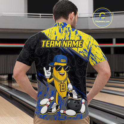 Man wearing a bowling-themed shirt with a cartoon character and 'Team Name' text in a bowling alley.