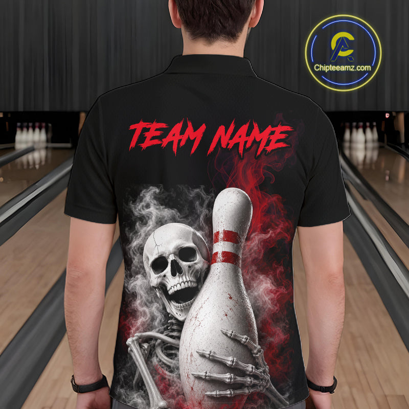A man viewed from behind wearing a black short-sleeve polo shirt with a large bowling-themed graphic on the back. The design features red 'TEAM NAME' text, a white bowling pin, a skull, and a skeleton hand with smoke effects.
