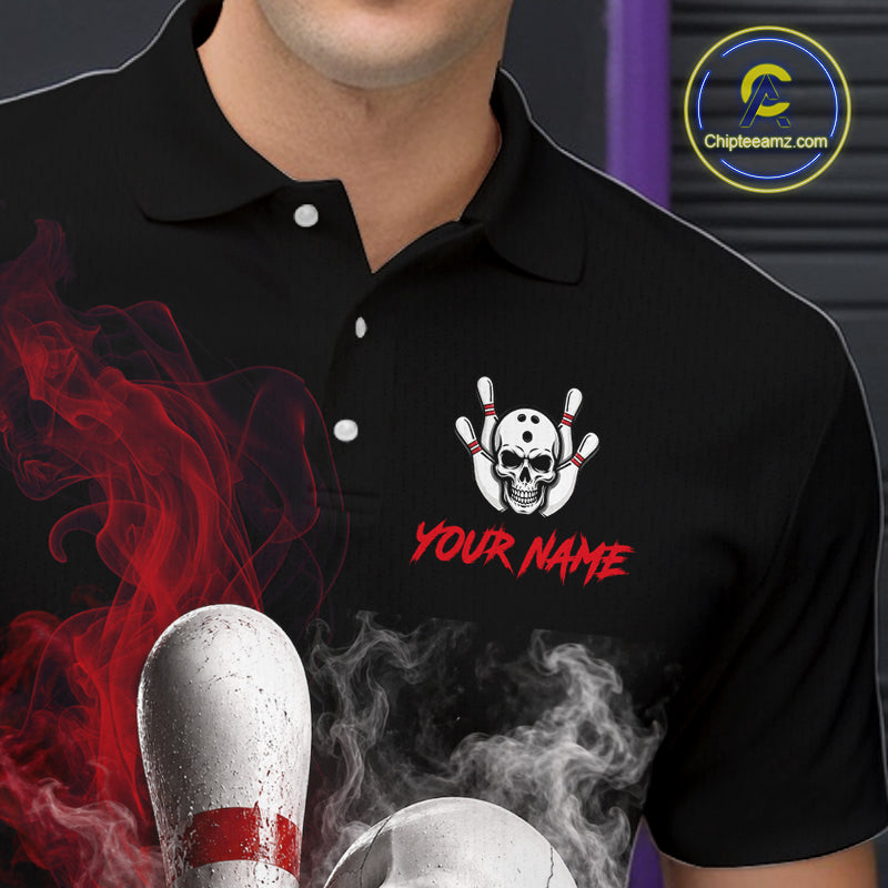A man wearing a black polo shirt with a custom bowling-themed graphic. The graphic features a white skull and bowling pins, red smoke effects, and the text 'YOUR NAME' in red.
