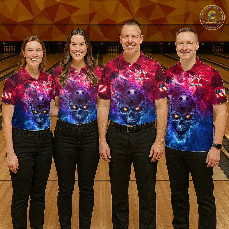 Four people standing in a bowling alley wearing matching bowling shirts with a colorful cosmic skull print. The shirts feature a gradient of pink, purple, and blue with a skull graphic and bowling pins.