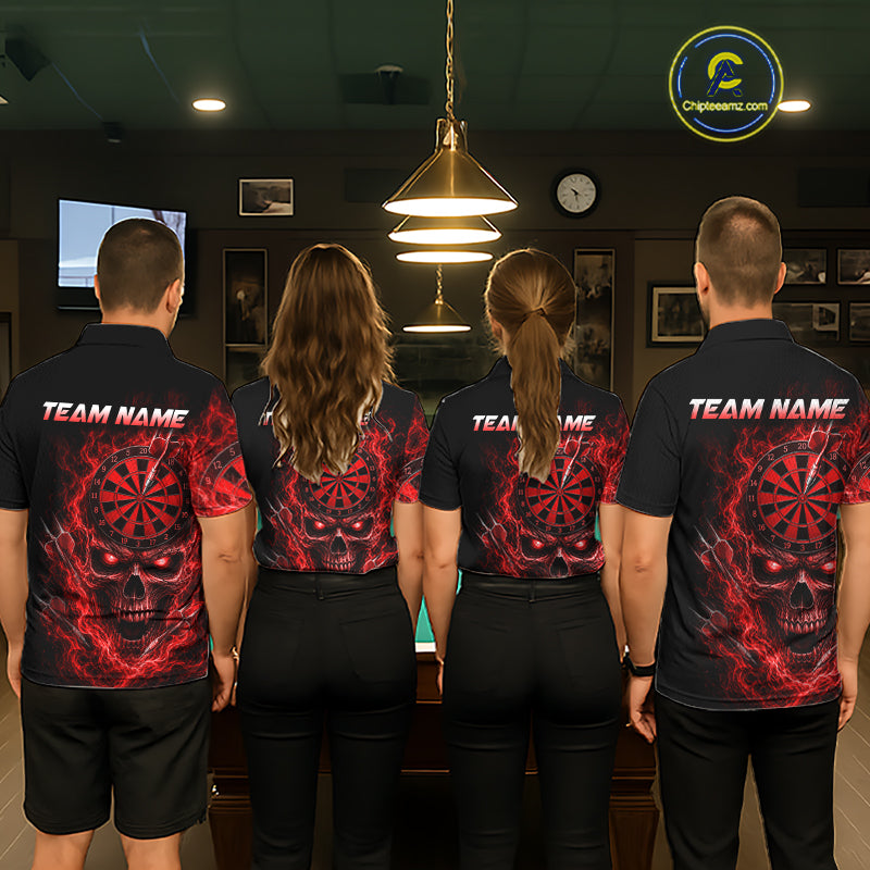Four people standing with their backs to the camera in a dimly lit indoor room, wearing matching black short-sleeve shirts with a red and black skull-and-dartboard graphic and white 'TEAM NAME' text across the upper back.
