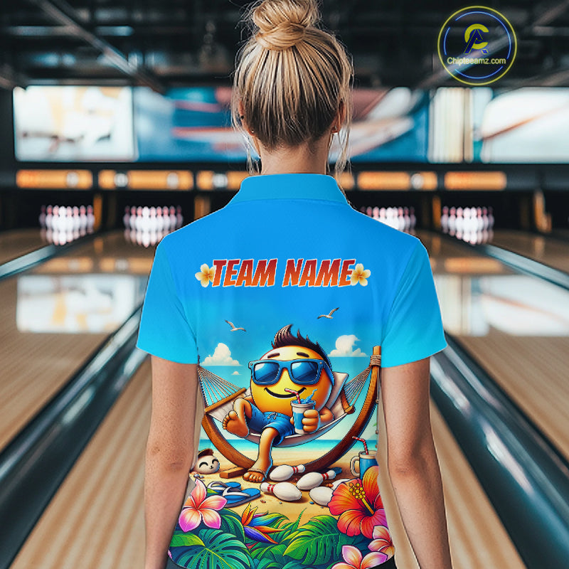 Women wearing a summer shirt with a colorful design and 'TEAM NAME' text in a bowling alley.